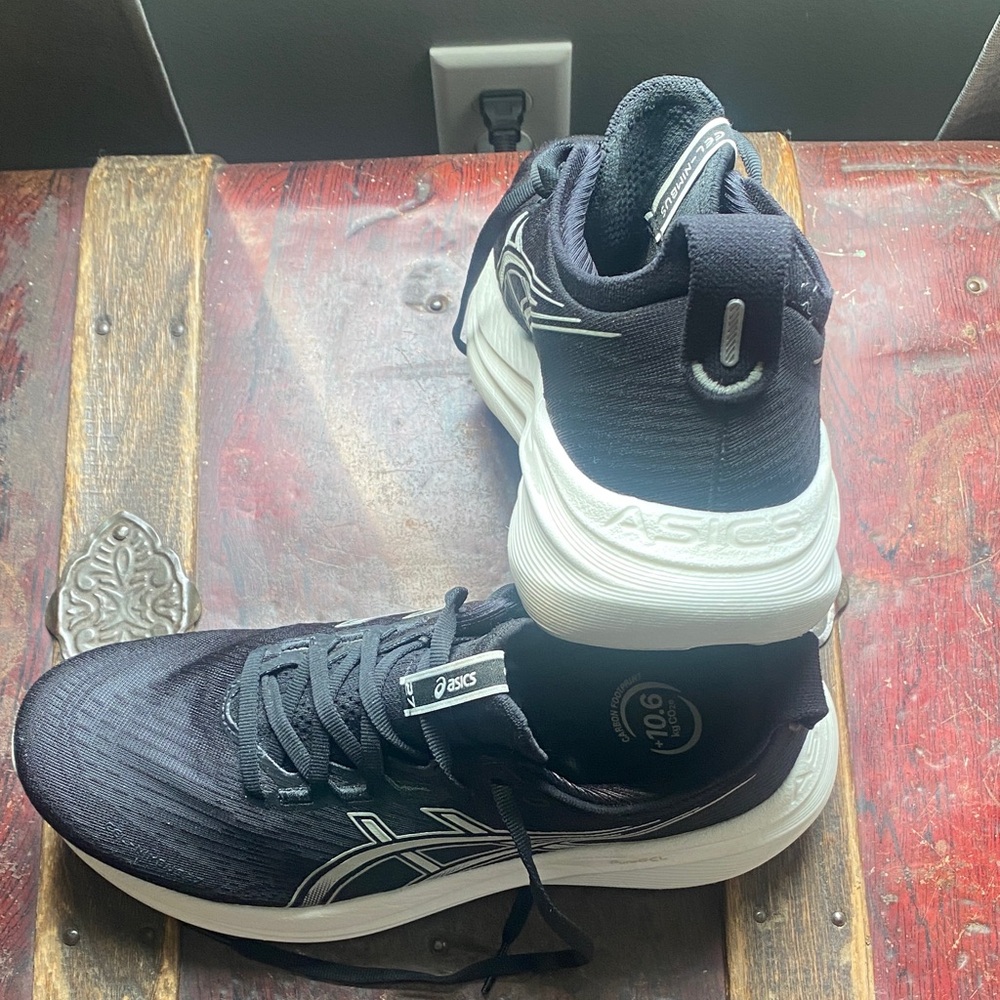 ASICS Gel Nimbus 27 Black and White Women's Sneakers - Running shoes.